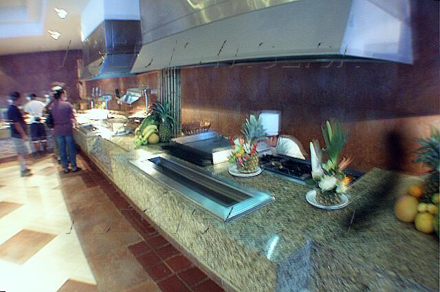 Mexique Cancun New Gran Caribe Real With dishes prepared before you.