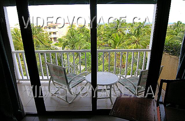 Cuba Cayo Guillermo Iberostar Daiquiri The standard size balcony which includes chairs and a table.