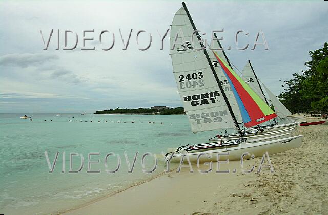 Cuba Guardalavaca Playa Costa Verde Several sailboats and catamarans available on the beach.