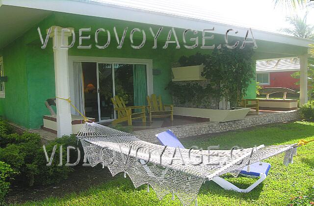 Cuba Guardalavaca Paradisus Rio de oro The courtyard with hammocks, sun loungers and chairs on the terrace.