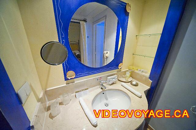 Cuba Guardalavaca Playa Pesquero The counter of the bathroom with a magnifying mirror, powerful lighting, ...