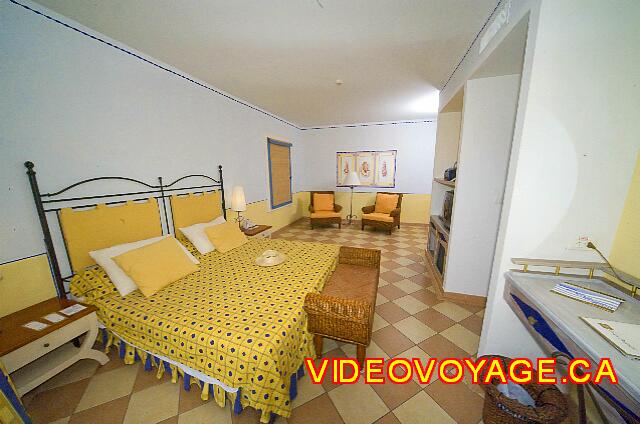 Cuba Guardalavaca Playa Pesquero A large bedroom with a sitting section.