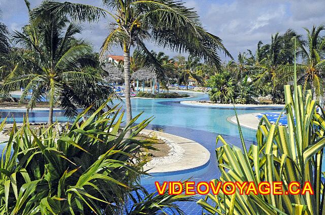 Cuba Guardalavaca Playa Pesquero A beautiful swimming pool divided into two sections by a passage in the center of the pool.