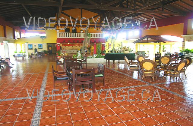 Cuba Guardalavaca Memories Holguin Beach Resort The lobby bar with the piano at the bottom center of the Lobby. Basically, the reception.