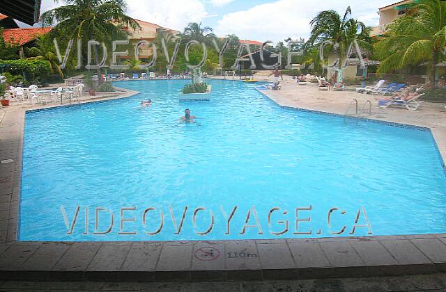 Cuba Guardalavaca Sol Rio De Luna Y Mares The pool view from the pool bar. Some chairs and little umbrellas.