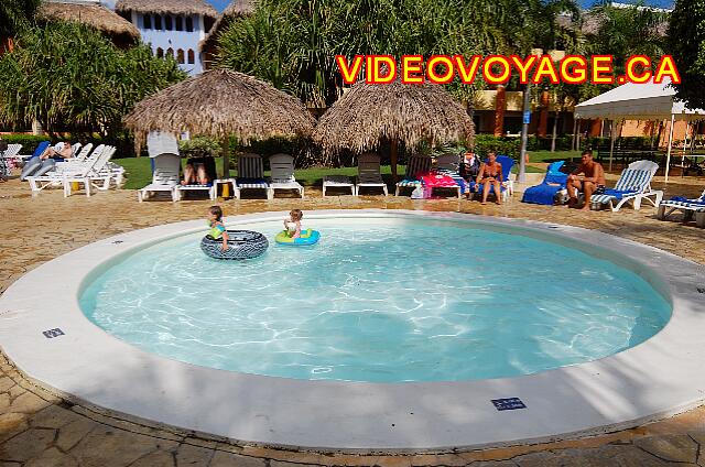 Republique Dominicaine Puerto Plata Iberostar Costa Dorada A paddling pool for younger children. Some trees allow concealed some sun to avoid sunburn. The pool is visible from everybody, so easy to monitor.
