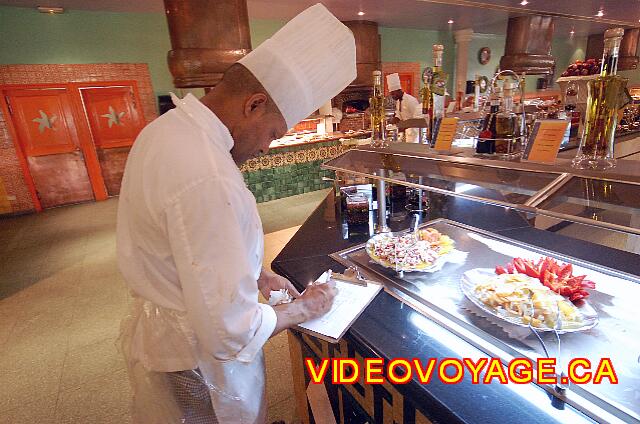 Republique Dominicaine Puerto Plata Iberostar Costa Dorada A quality control on the Food Show Displays. Here, verification of the temperature of food.