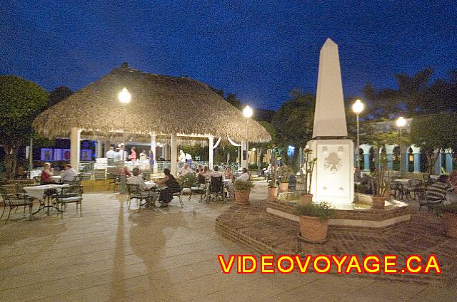 Republique Dominicaine Puerto Plata Iberostar Costa Dorada The obelisk and left under the roof, people meet after a wedding ceremony.