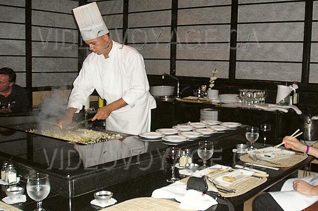 Republique Dominicaine Punta Cana Gran Bahia Principe The cook using the griddle.