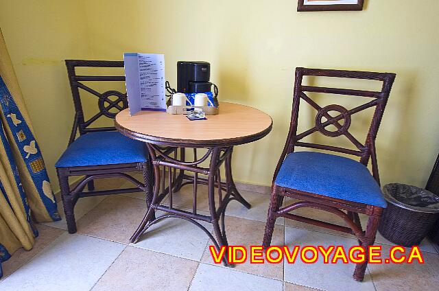 Republique Dominicaine Punta Cana Barcelo Dominican A small table with 2 chairs.