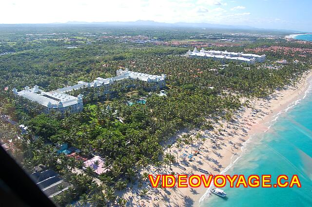 Republique Dominicaine Punta Cana Riu Palace Macao Una hermosa playa, en el fondo, con muchas palmeras en la playa ...