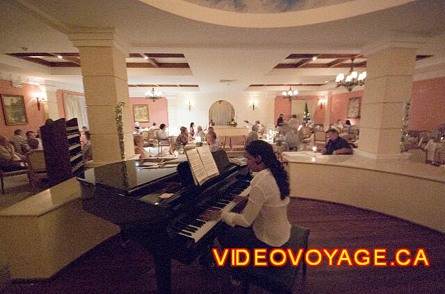 Cuba Cayo Santa Maria Melia Las Dunas With a piano in the center of the restaurant for soft mood music.