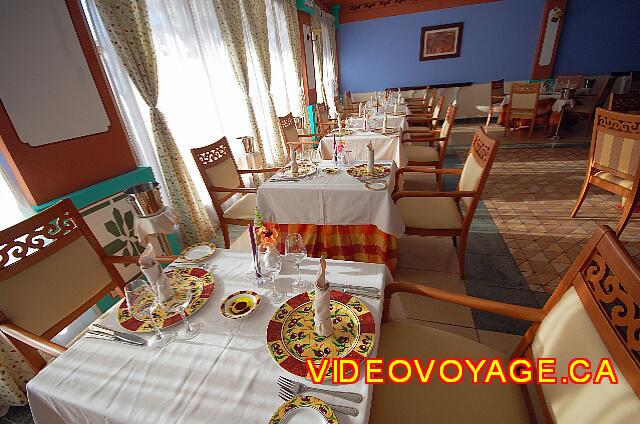 Cuba Cayo Santa Maria Melia Las Dunas Several tables for couples on the edge of the windows.