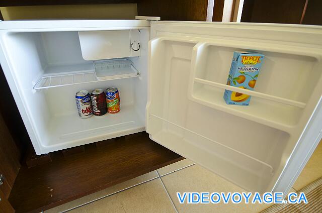 Cuba Cayo Santa Maria Melia Buenavista The fridge with a small freezer, including refreshing drinks, bottled water, juice, ...