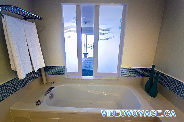 Cuba Varadero Melia Marina Varadero A bath with a sliding door to see in the room.