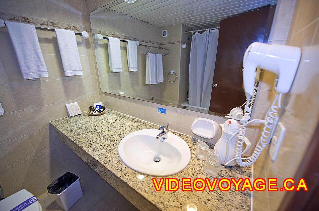 Cuba Varadero Bellevue Puntarena Playa Caleta Resort The counter of the bathroom with a large mirror.