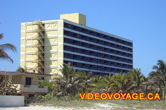 Cuba Varadero Bellevue Puntarena Playa Caleta Resort A hotel surrounded by palm.