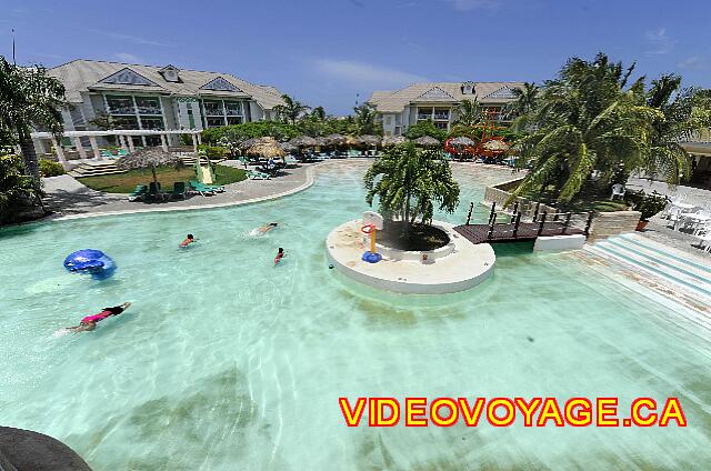 Cuba Varadero Melia Peninsula Varadero A view of the pool from the fort. We can see several palapas and loungers on the poolside.